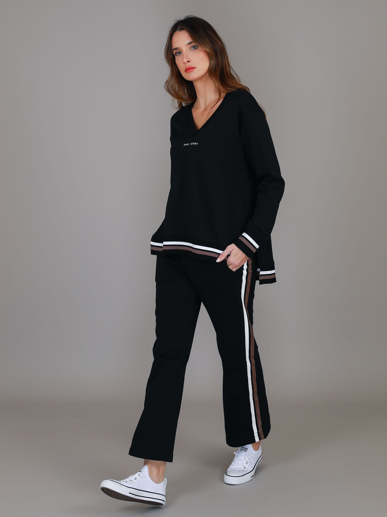black v neck jumper #color_black