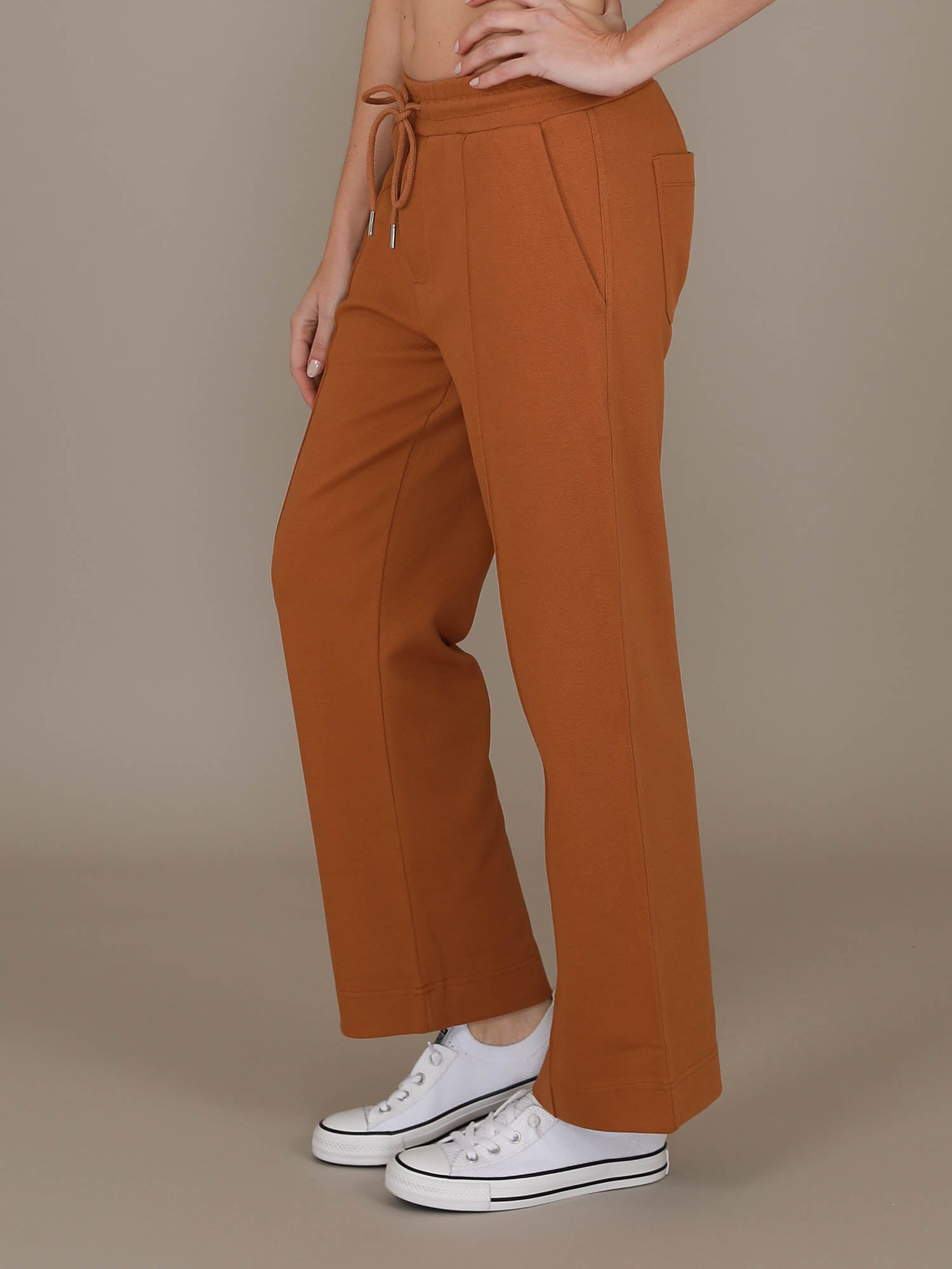 rust coloured pants #color_copper