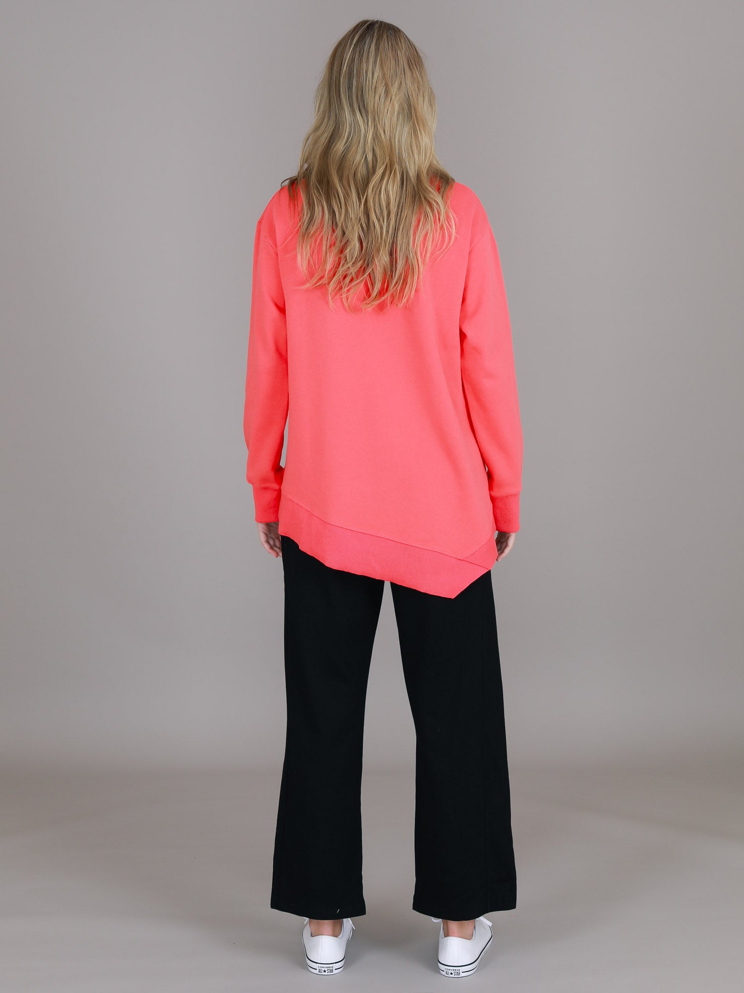 red jumper #color_poppy red