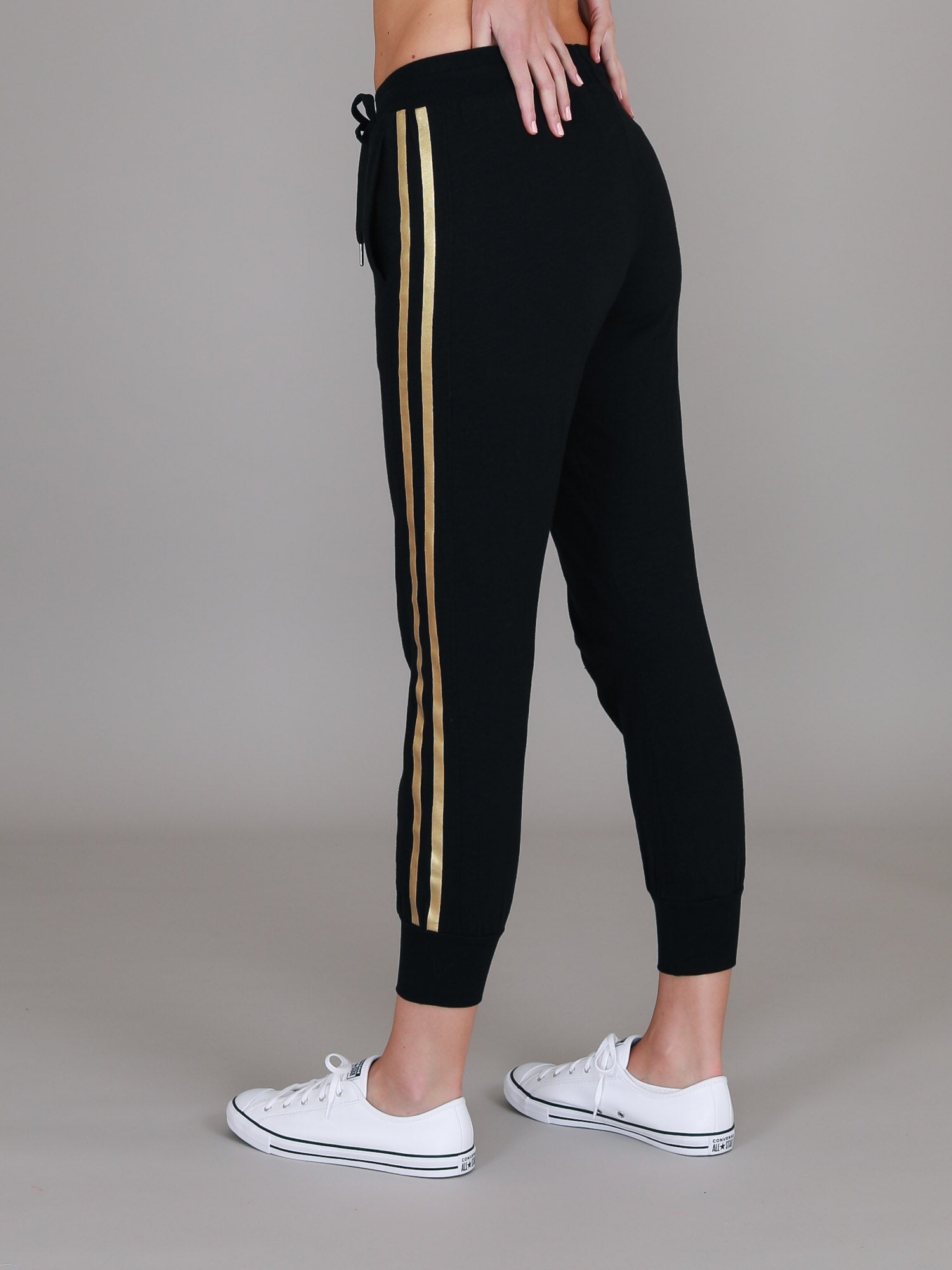 womens black track pants #color_black/gold