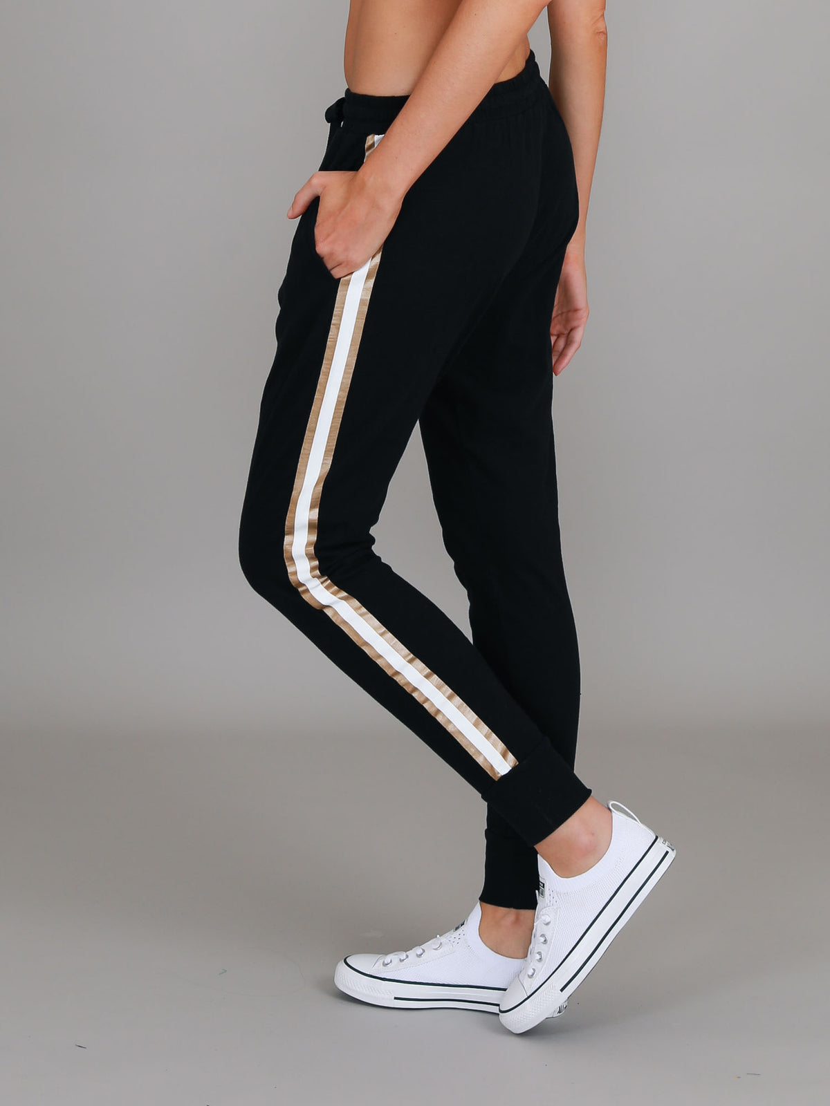black gold stripe joggers
