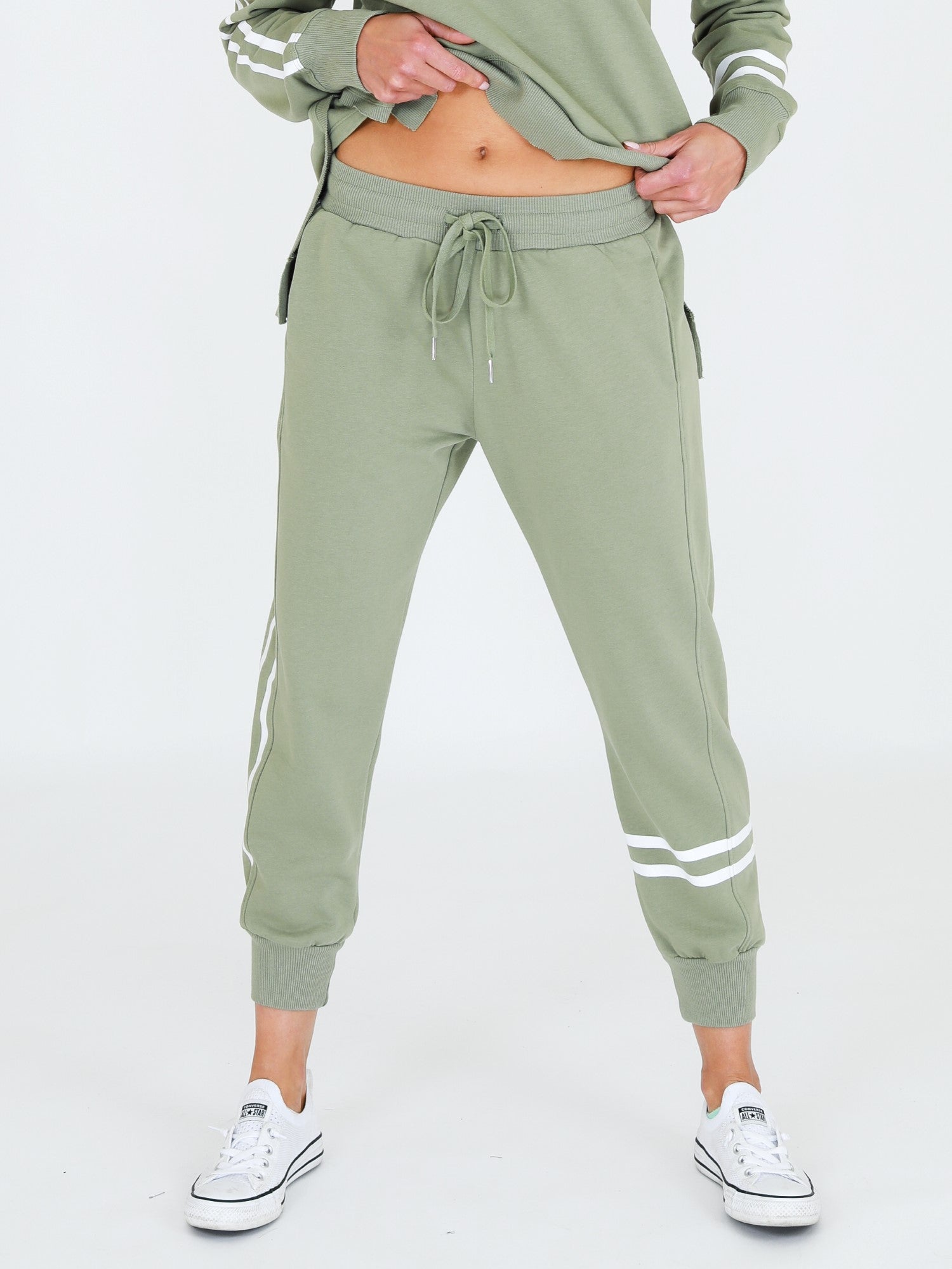 Green joggers with hot sale white stripe