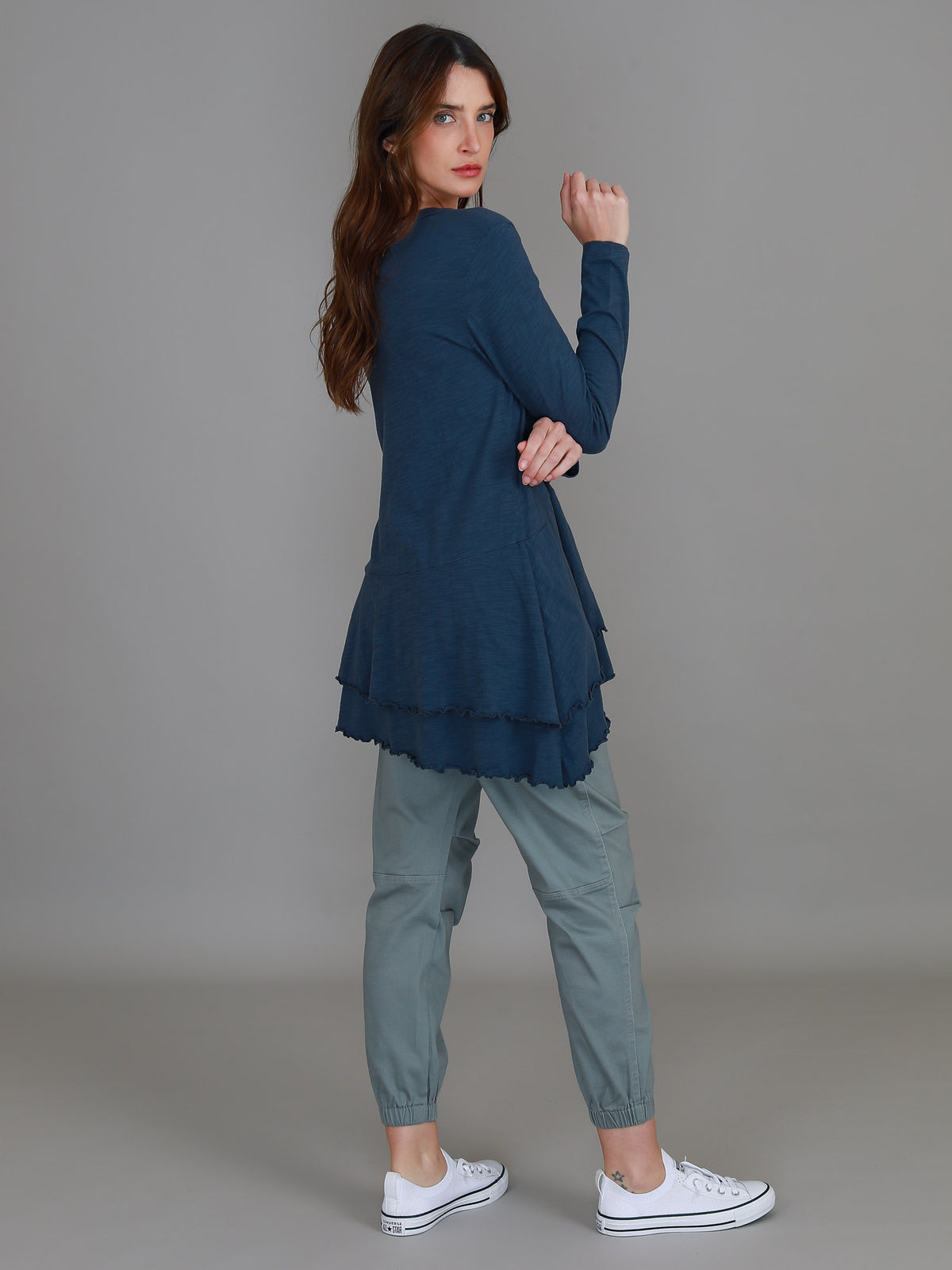 indigo ruffle hem long sleeve top
