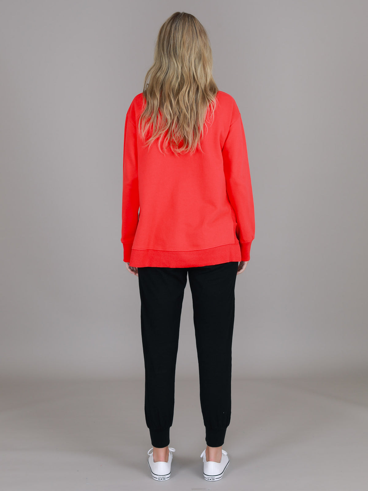 red oversized sweatshirt