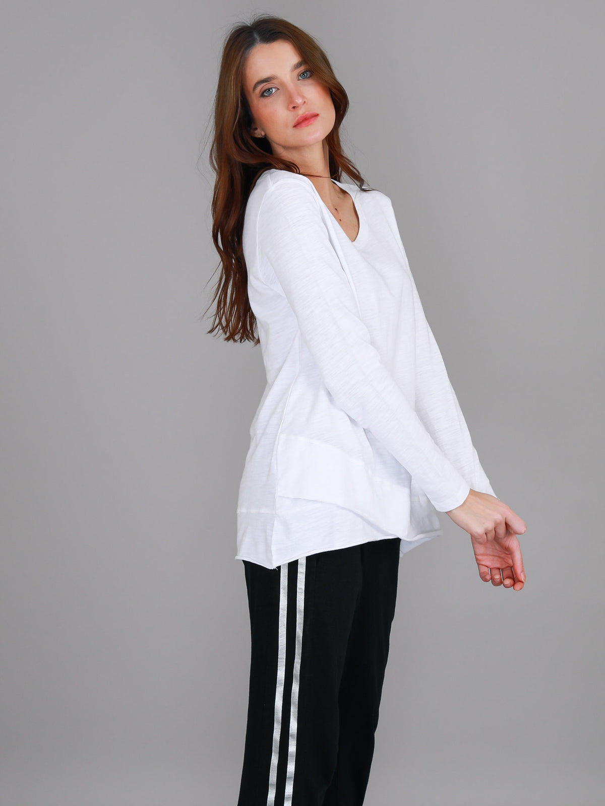 white curved hem long sleeve tee