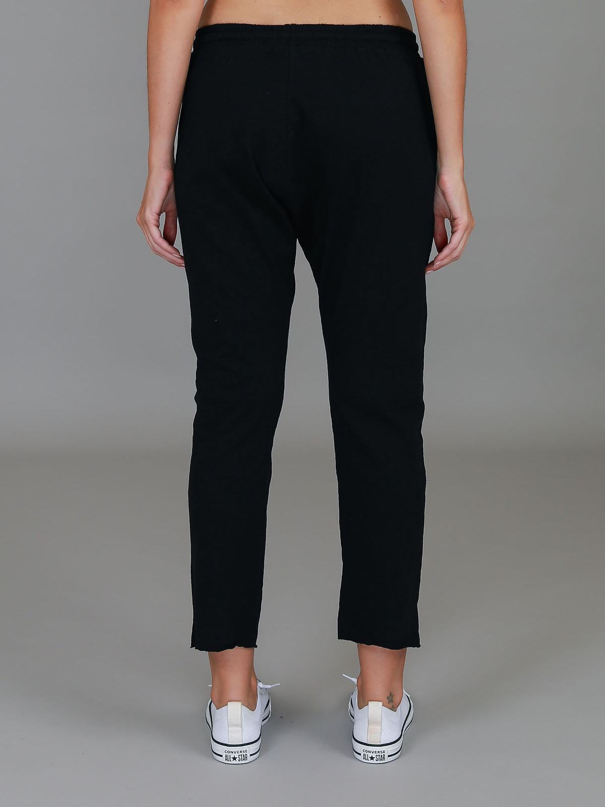 black raw edge joggers