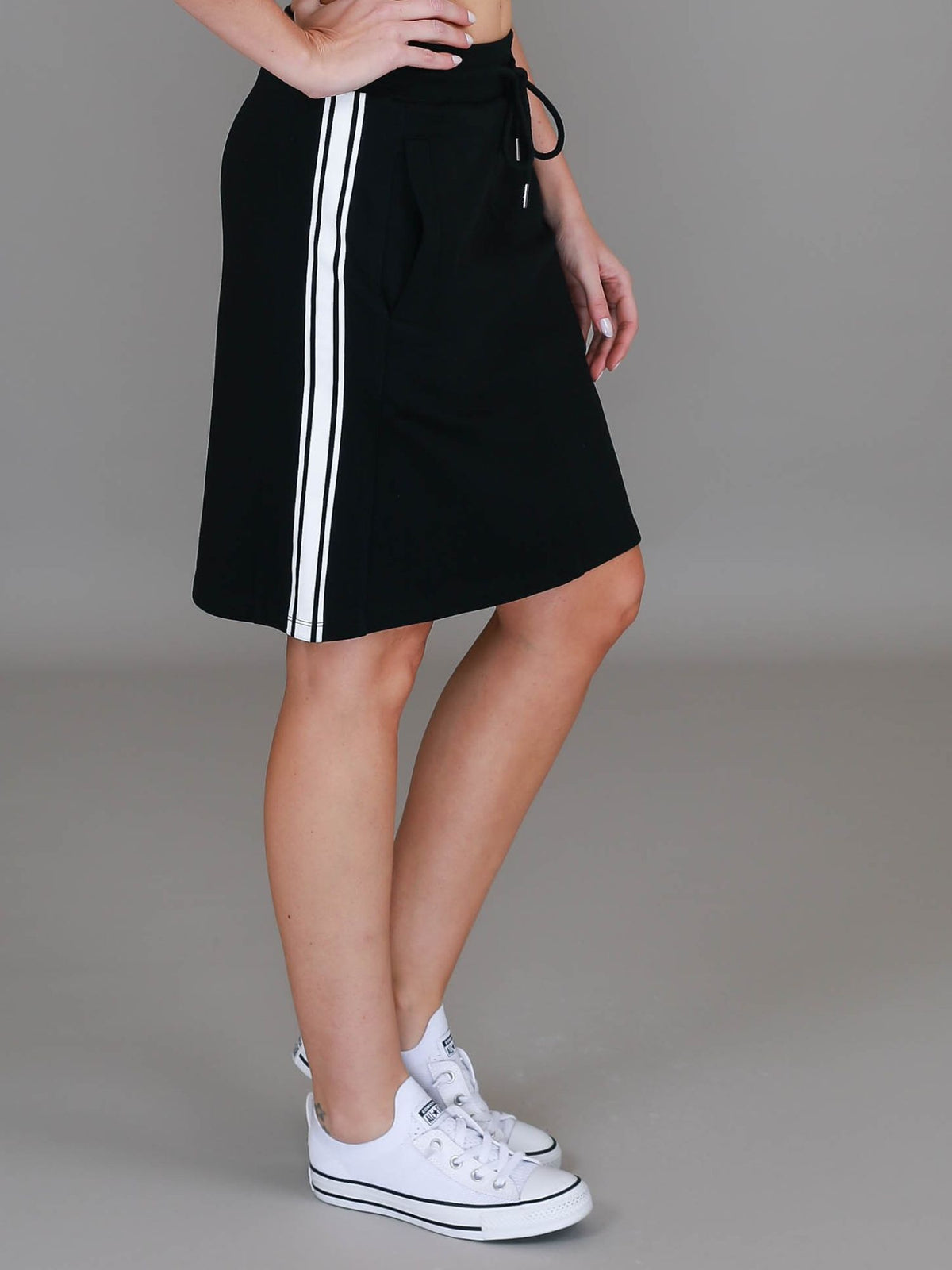 black knee length skirt #color_black