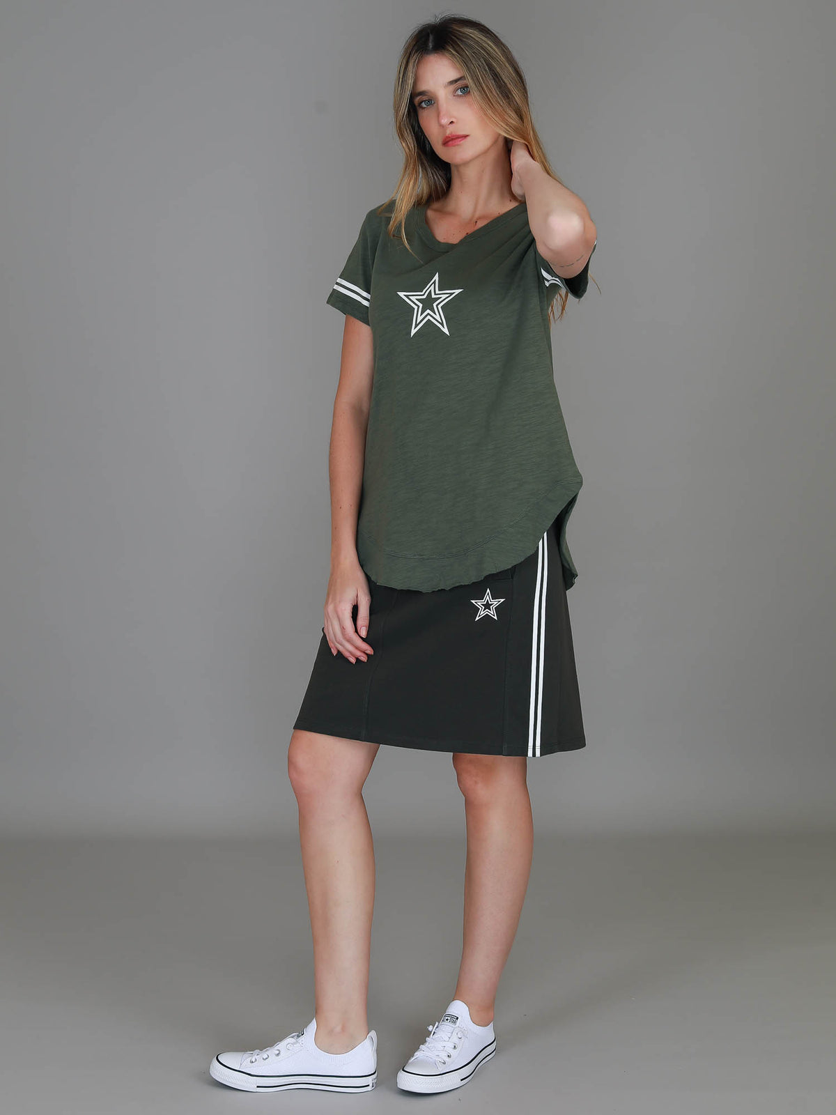 green pleated skirt