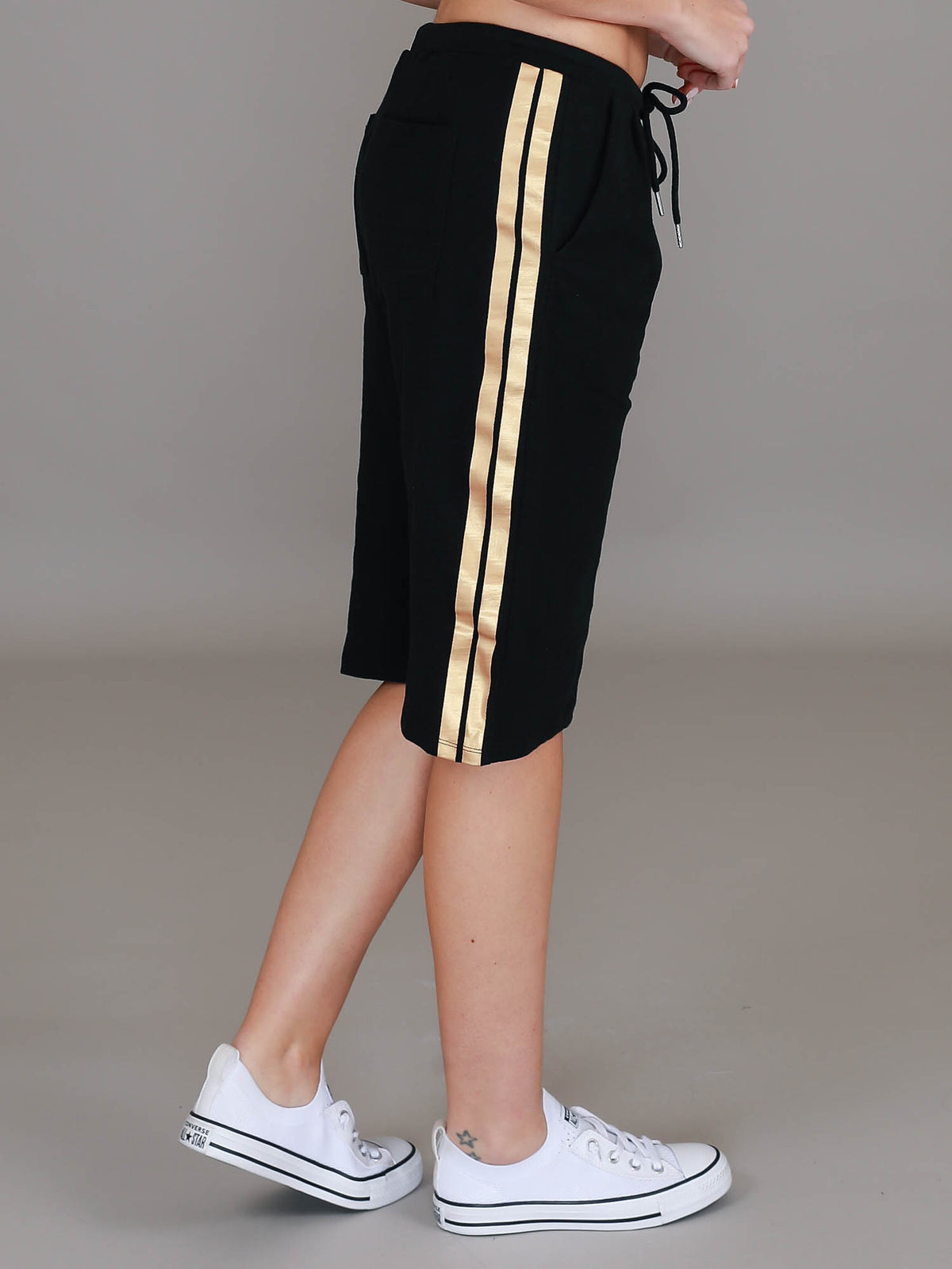 gold stripe jersey shorts #color_black/gold