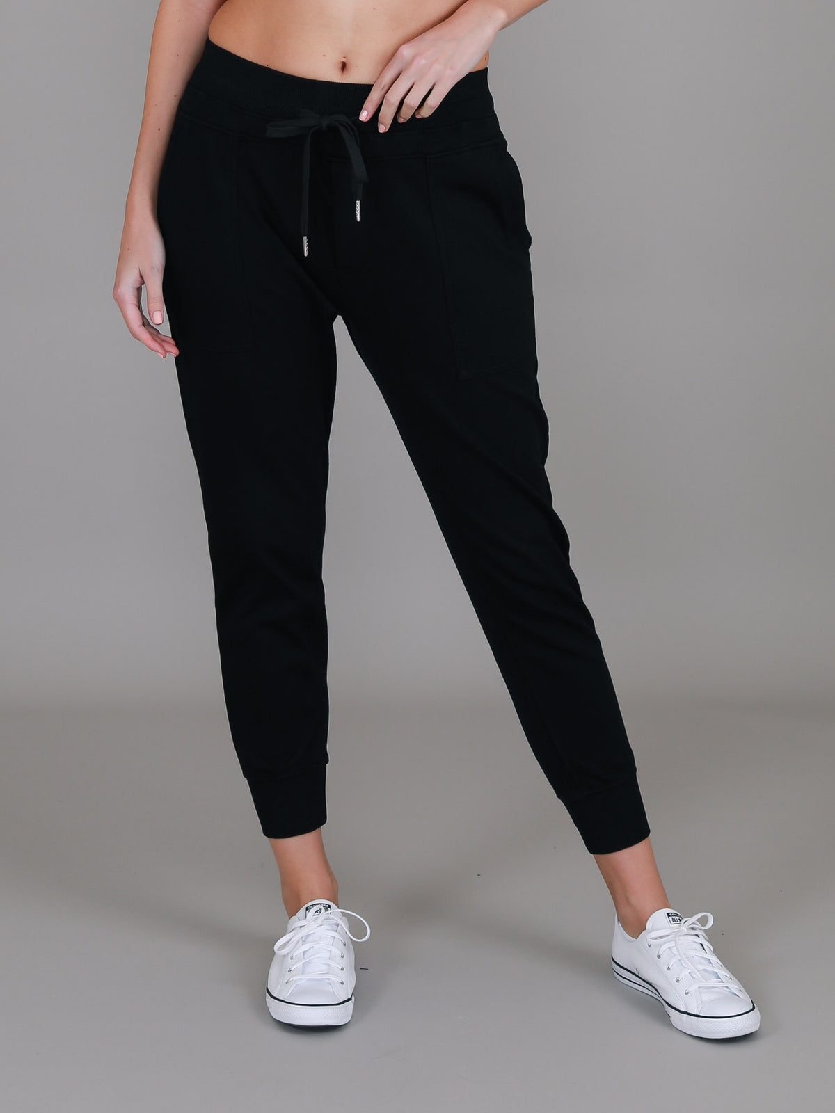 black sweatpants cuffed