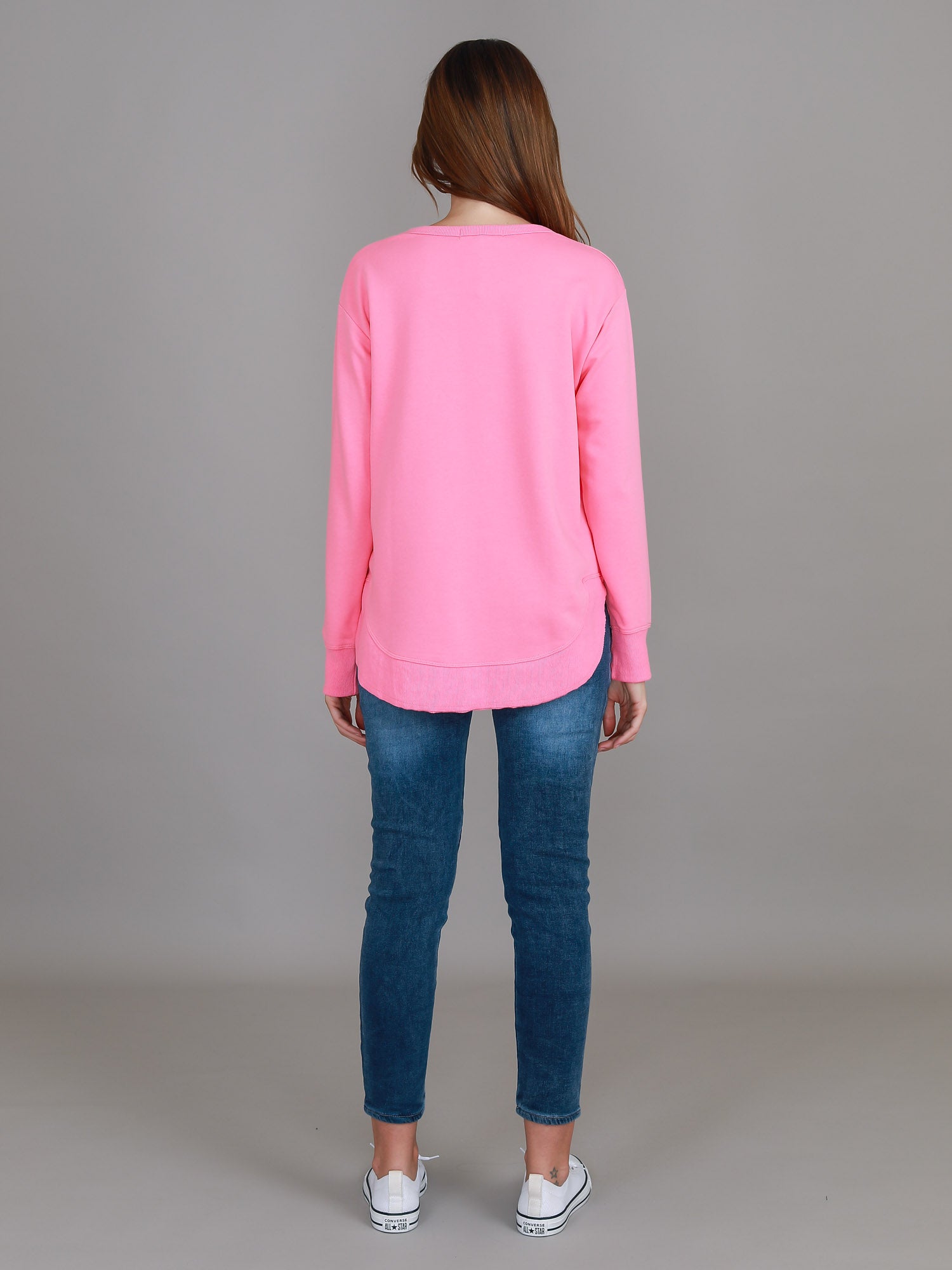 women in sweater #color_french rose