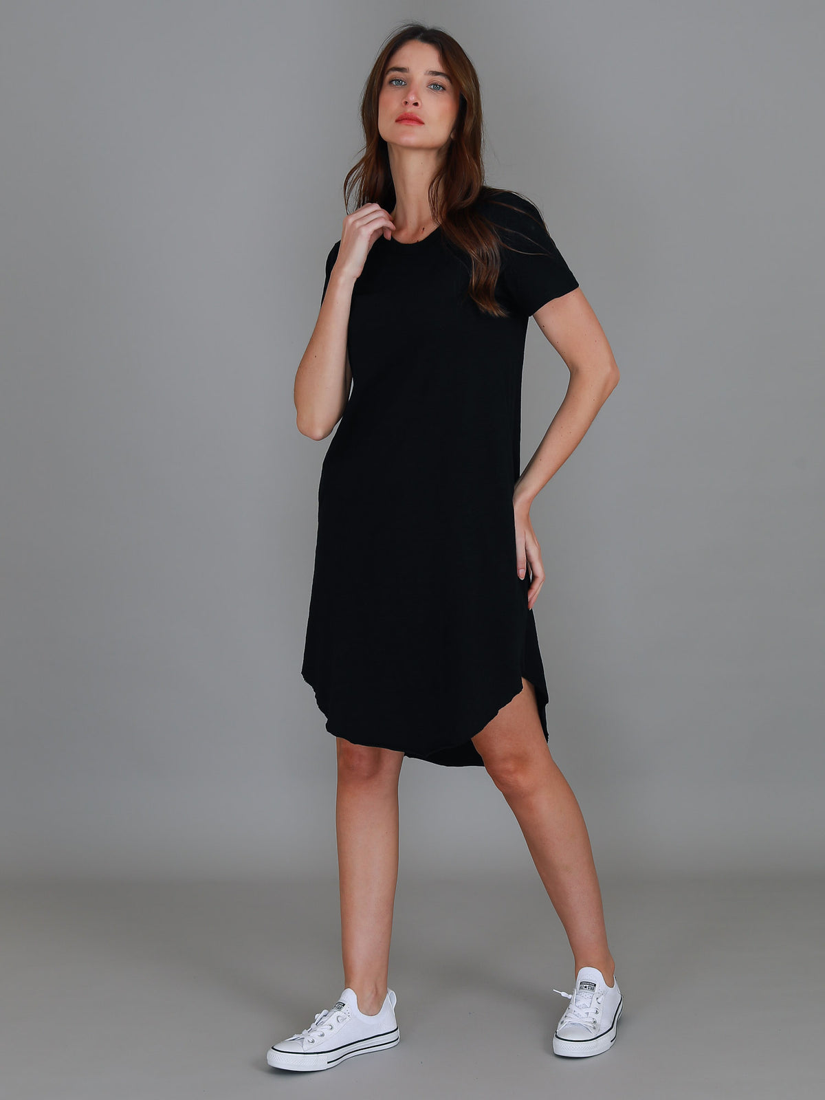 black curved hem dress
