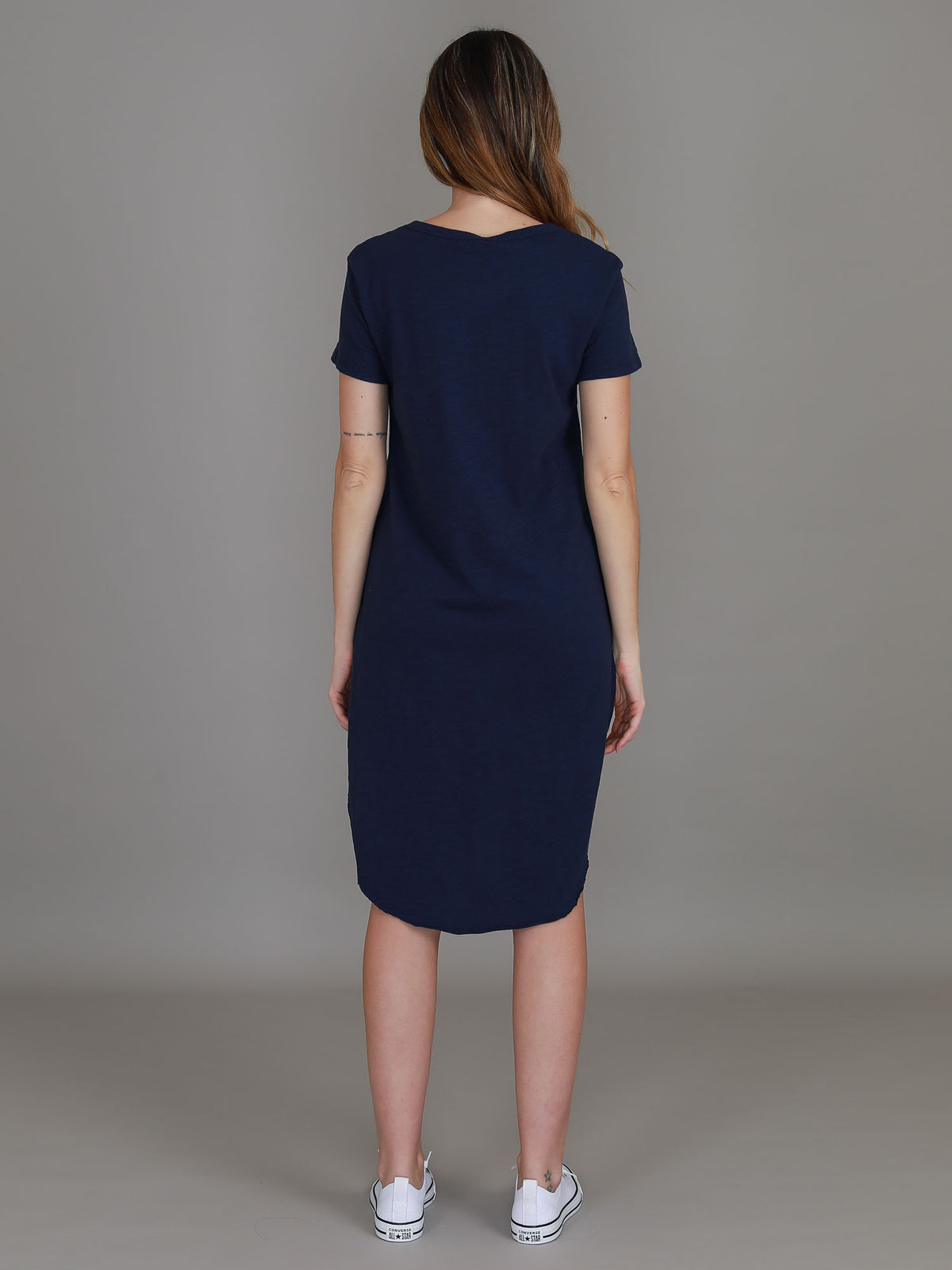 navy curved hem dress