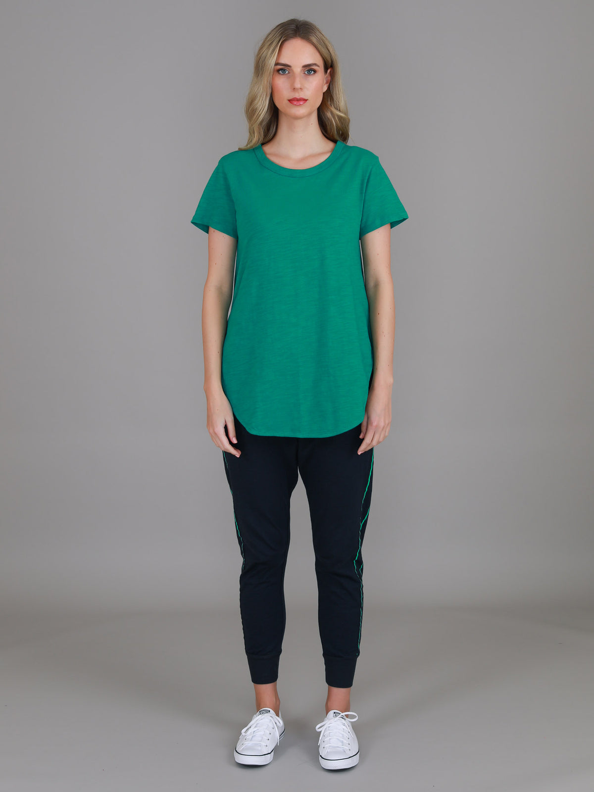 green curved hem tee