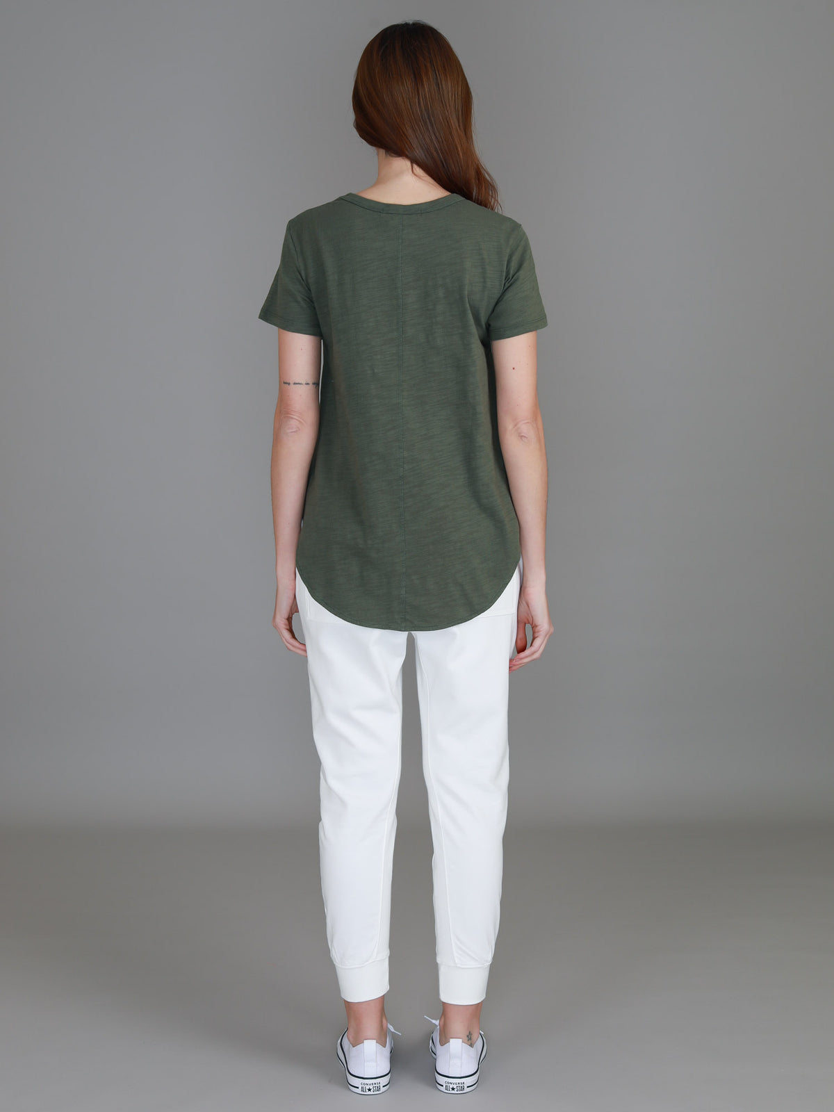 green curved hem tee