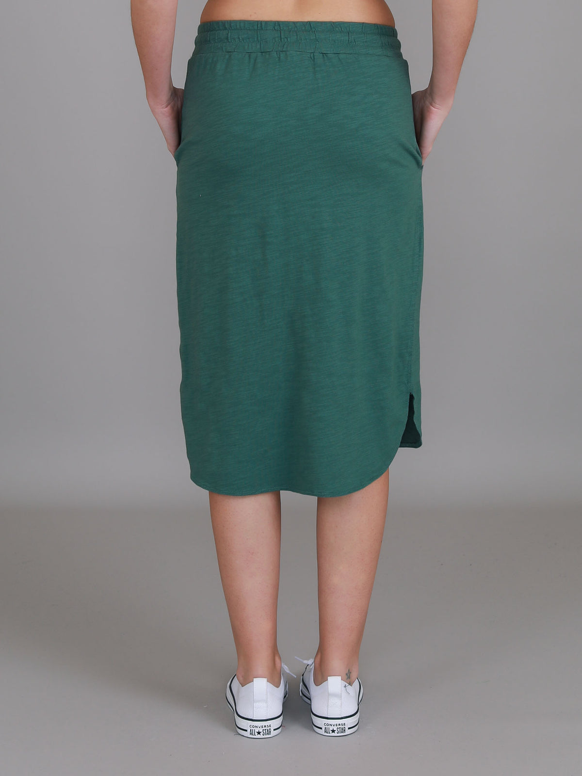 green knee length skirt
