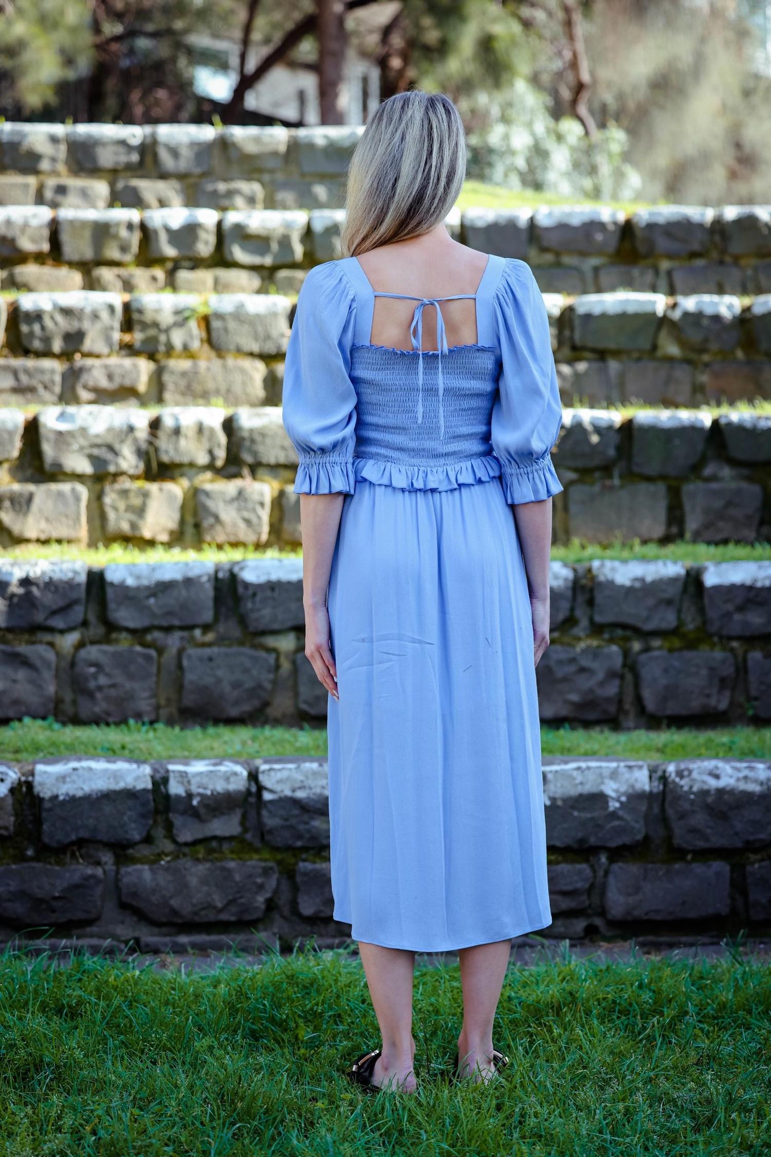 Blue ruffled dress with back tie